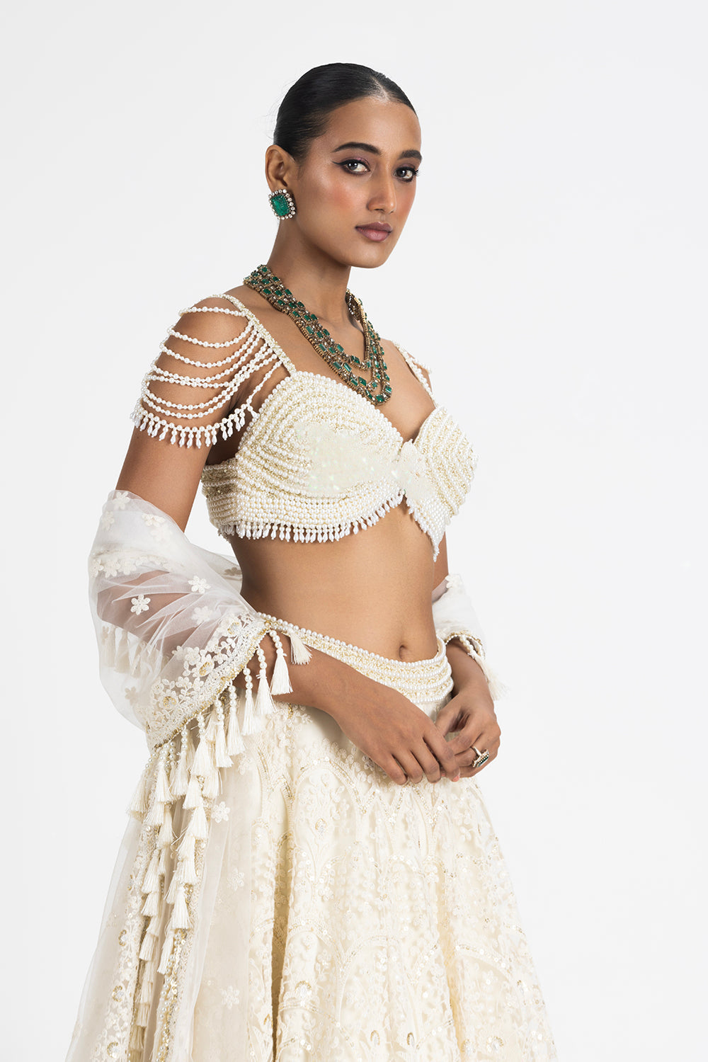 Off White Lehenga With A Pearl Embroidered Bustier And Duppata