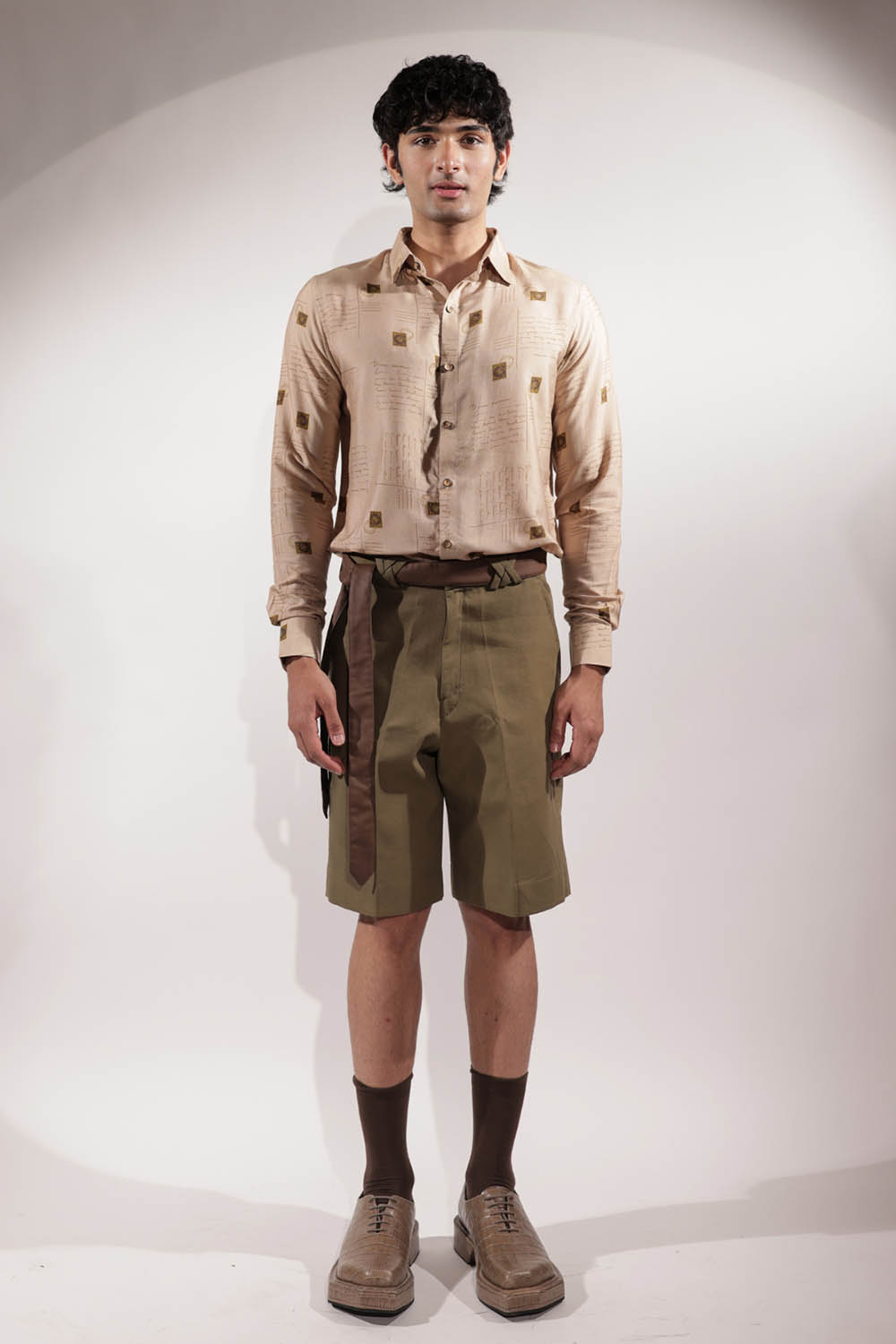 Olive linen shorts with Kantha detailing