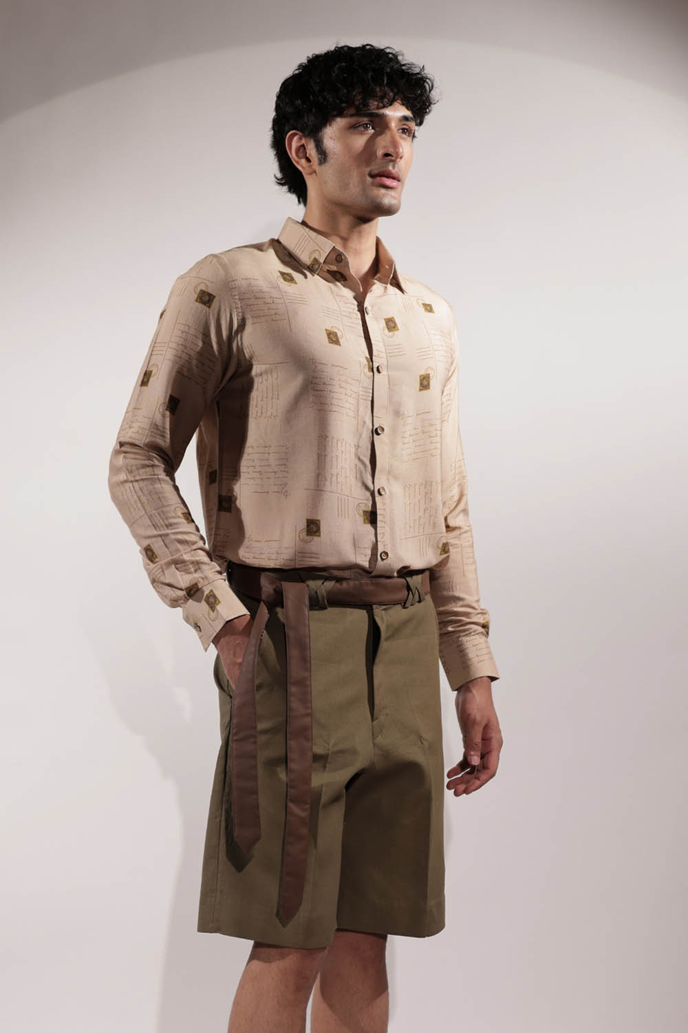 Olive linen shorts with Kantha detailing