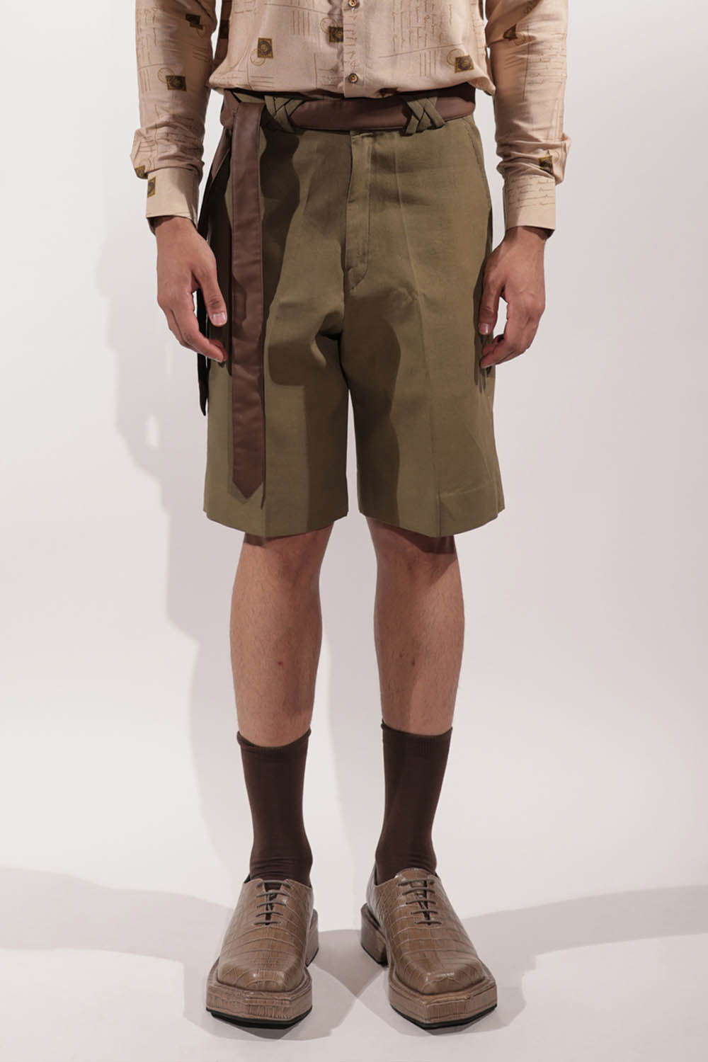 Olive linen shorts with Kantha detailing