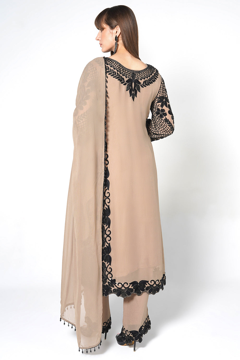Peach Georgette Kurta Set Featuring Intricate Black Embroidery And Sheer Dupatta