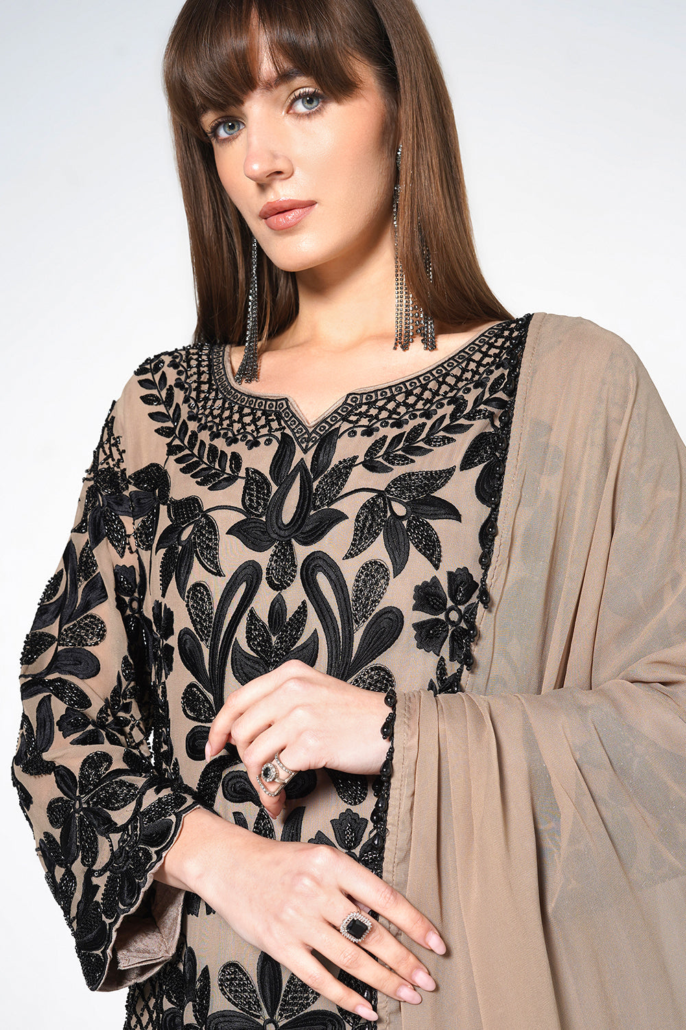 Peach Georgette Kurta Set Featuring Intricate Black Embroidery And Sheer Dupatta