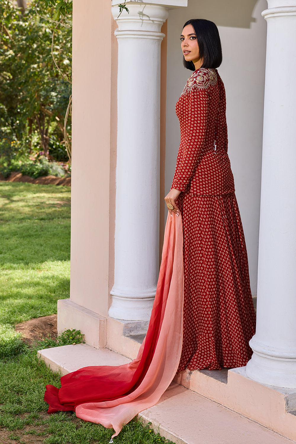 Red bandhani sharara set with ombre dupatta