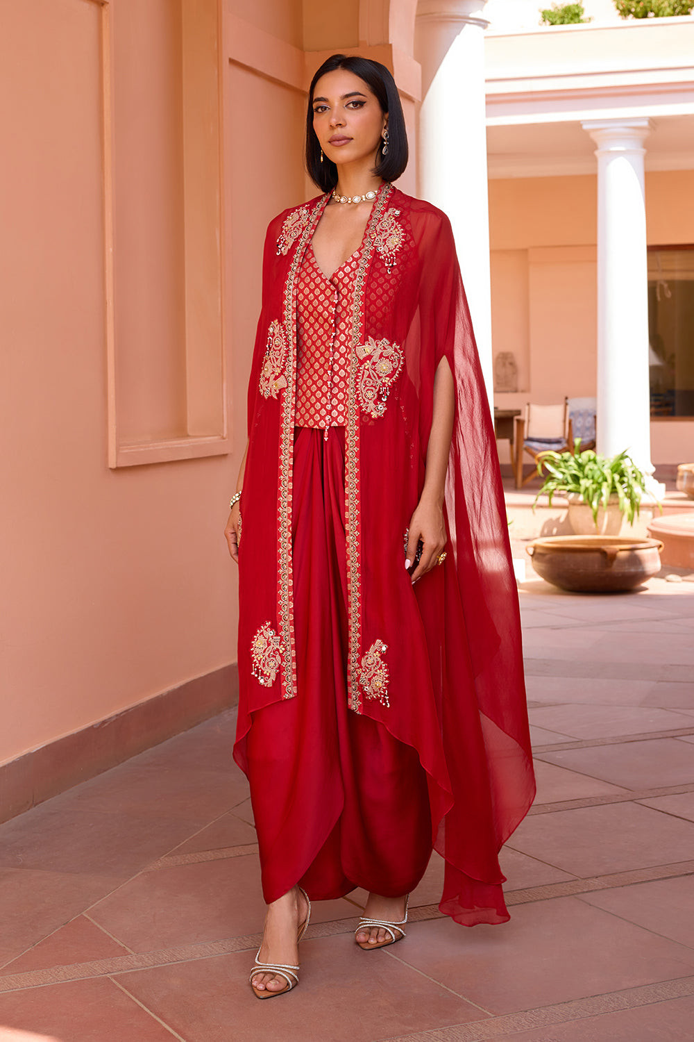 Red embroidered cape with waistcoat and skirt