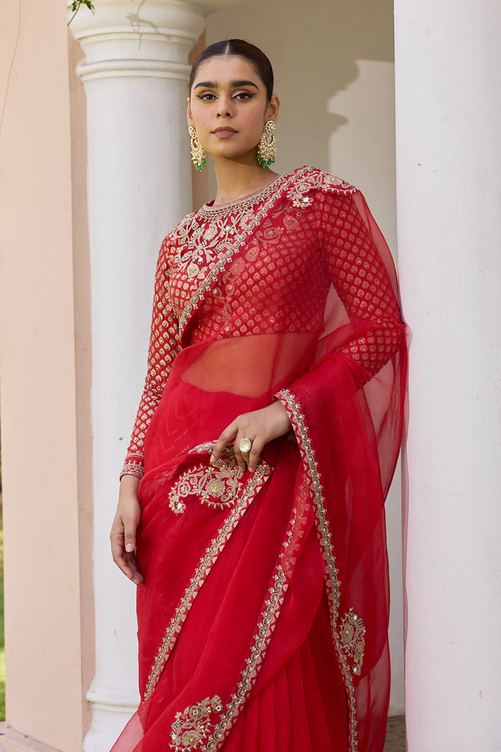 Red pure organza saree with embroidered blouse and jacquard under skirt