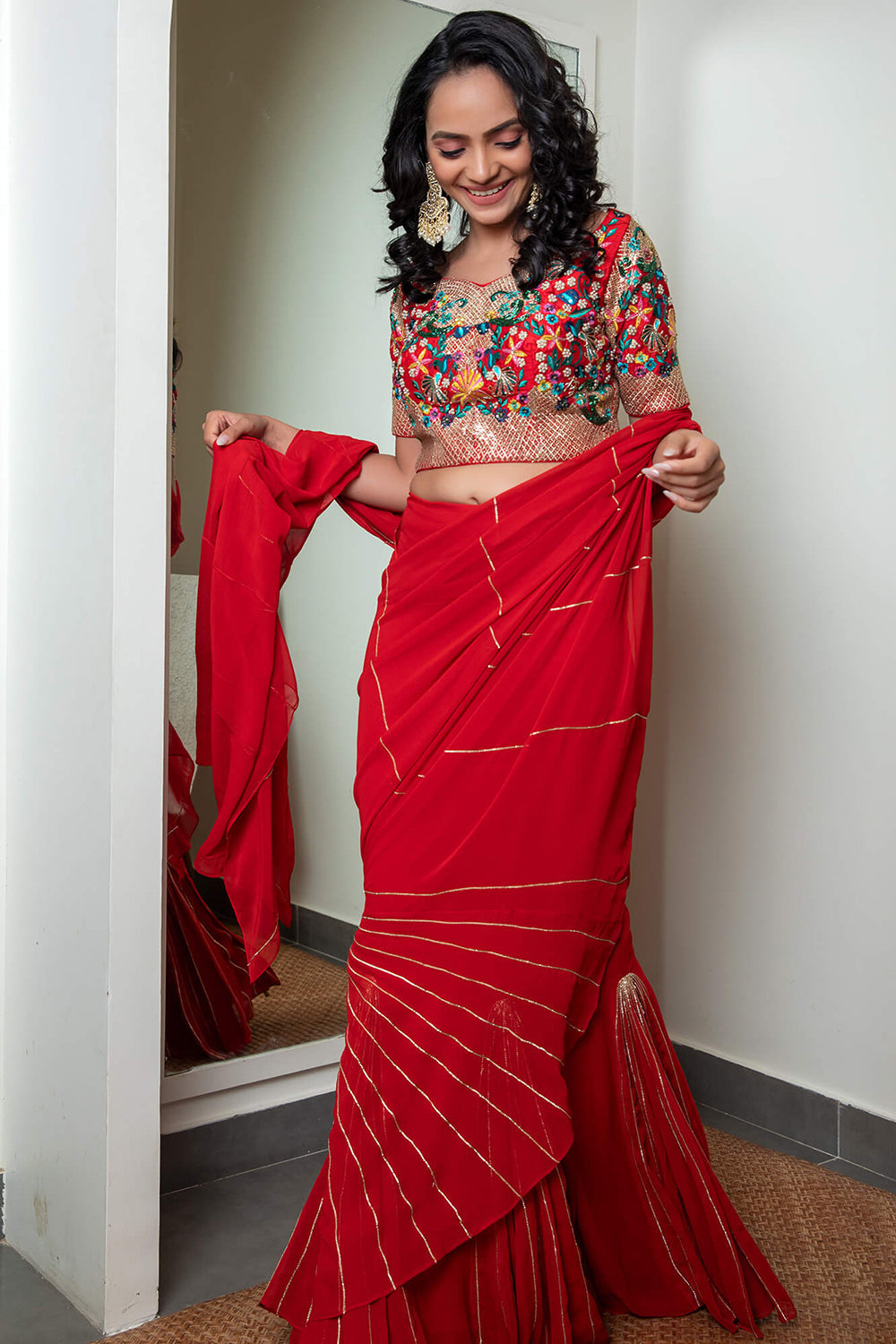Red kali saree with embroidered blouse