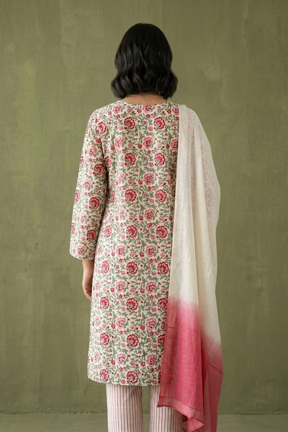 White allover block printed kurta paired with strips pants along with shaded duppata