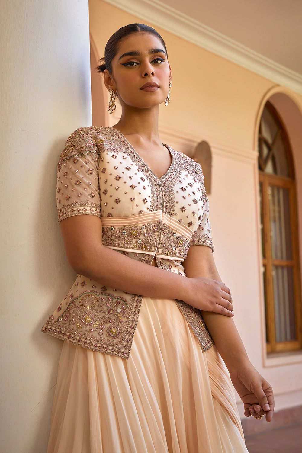 White pre draped lehenga saree with embroidered jacket