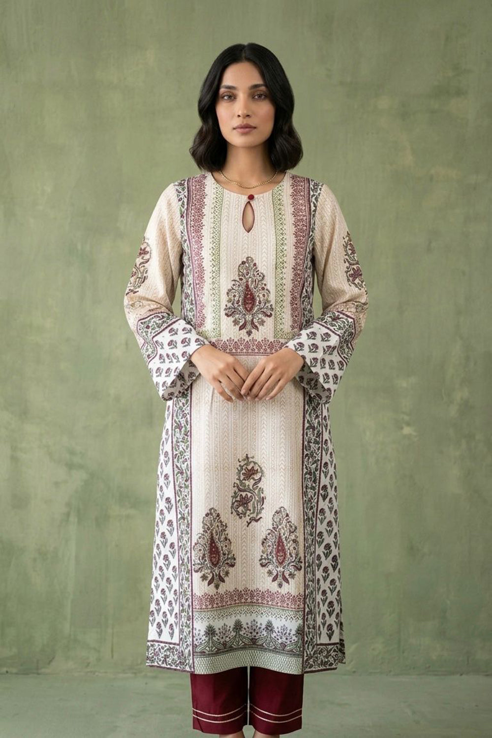 White traditional kurta paired with red pants