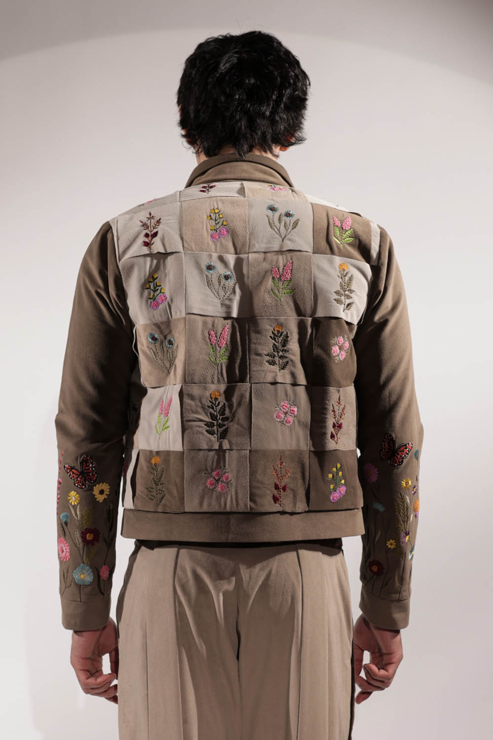 Woven Suede jacket with stamp-inspired floral embroidery