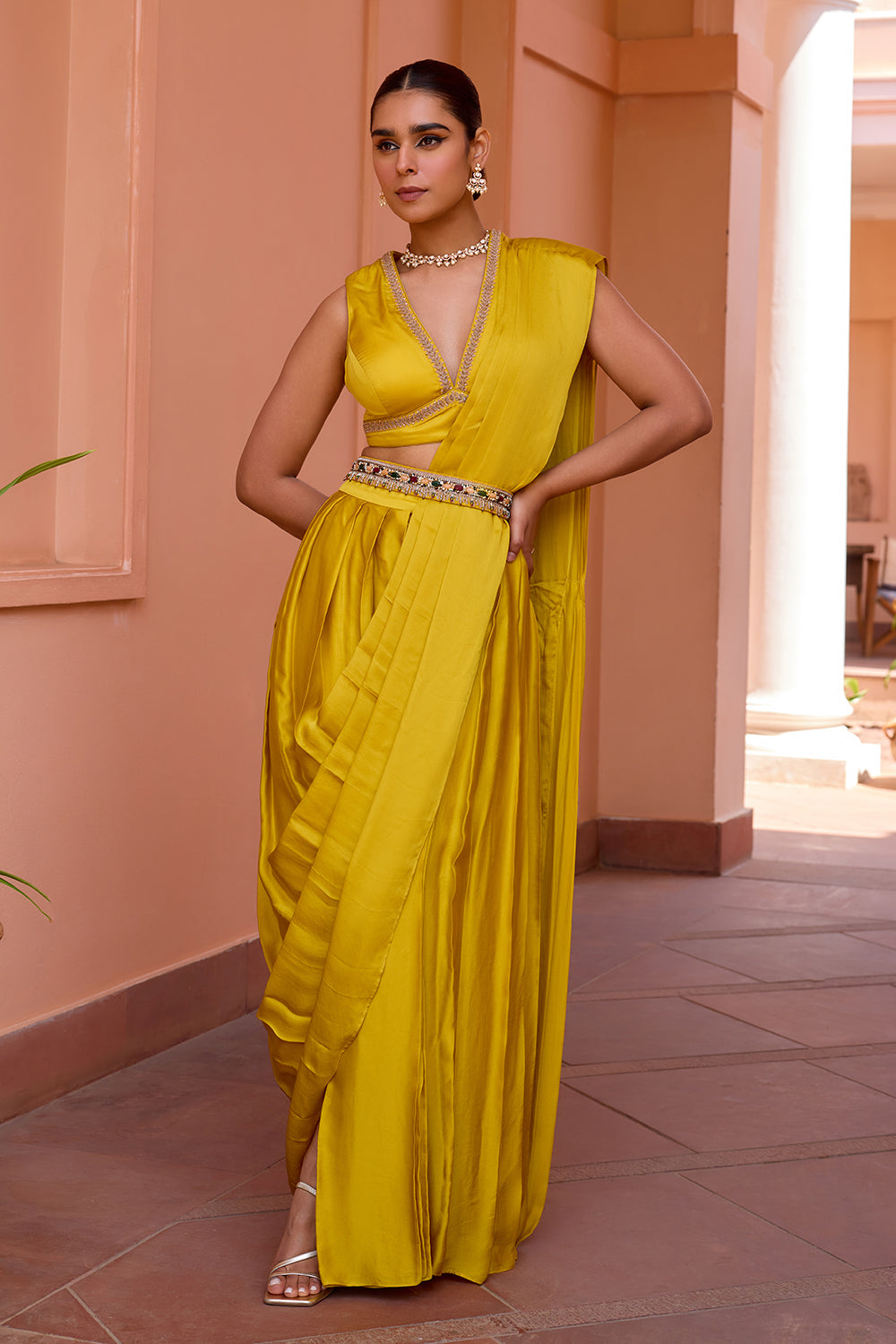 Yellow pre draped saree set with belt and embroidered blouse